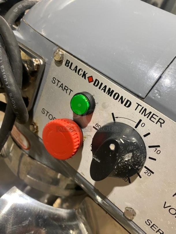 Black Diamond BDPM20 mixer control panel with start/stop buttons and timer dial. In good condition with visible markings.
