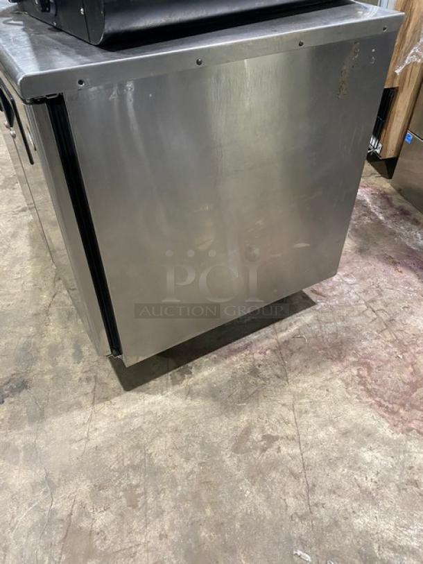 Everest ETR2 commercial stainless steel 2-door undercounter refrigerator, on casters, with poly-coated wire rack.