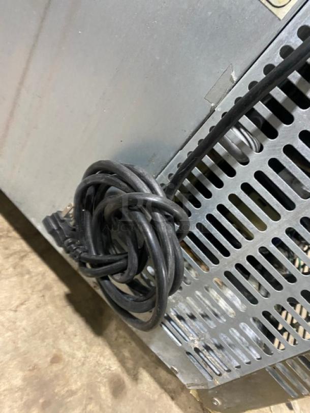 Everest ETR2 undercounter refrigerator, stainless steel, 2 doors, poly coated rack, on casters, 115V 1 phase, SN: BTR214030012.