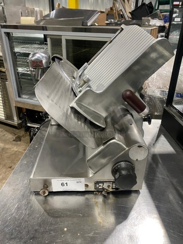 Globe commercial electric deli meat slicer, countertop model with knife feed on legs, stainless steel, good condition, knob controls.