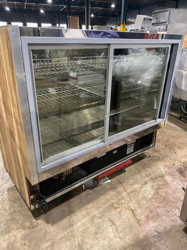 Marc SQBCR59 59" wooden flat glass refrigerated bakery display case with poly-coated wire racks and rear sliding doors.