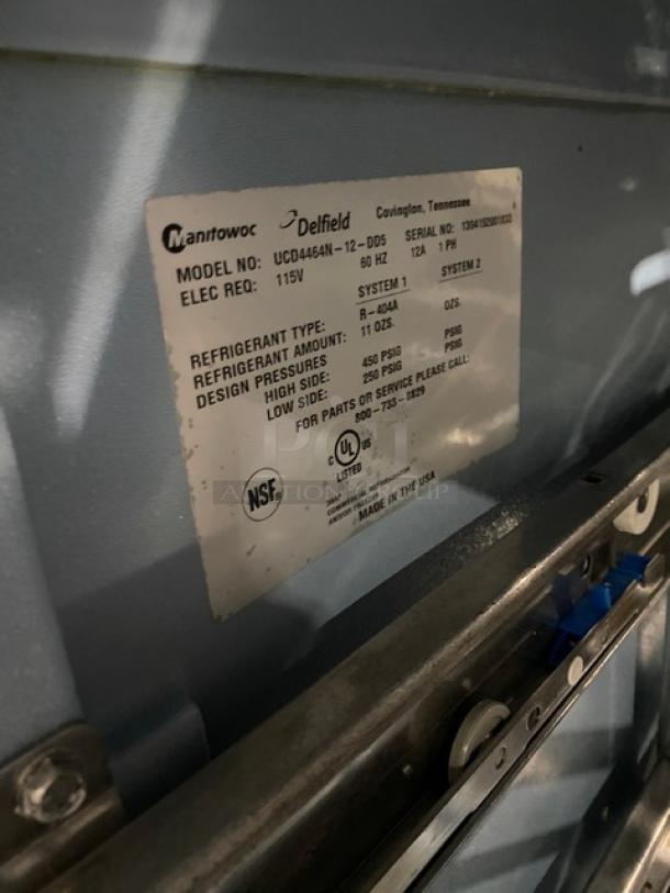 Delfield stainless steel refrigerated prep table, model UCD446N12DD5, with 4 drawers and overhead storage, 115V, 1 phase.