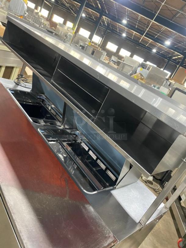 Delfield UCD446N-12-DD5 refrigerated prep table, stainless steel, 4 drawers, overhead storage, excellent condition.