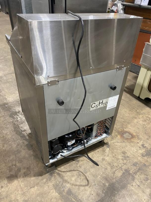 Atosa MSF8305GR stainless steel refrigerated prep table, model 2021, on casters, with poly coated wired rack, 115V 1-phase.