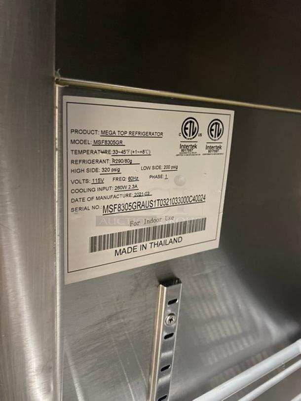 Atosa commercial stainless steel single door refrigerated prep table, Model MSF8305GR, 2021, on casters, with poly-coated rack.