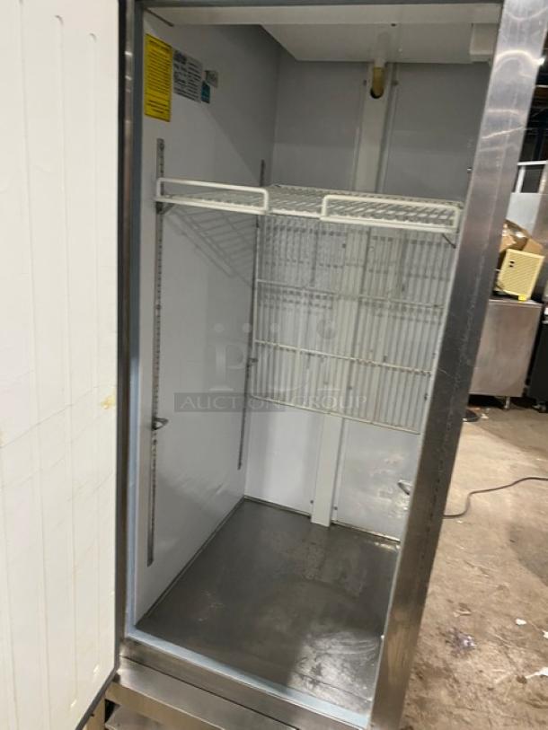 Entree CR1-ES stainless steel reach-in refrigerator, single door, Energy Star certified, with poly coated wired rack, on casters.