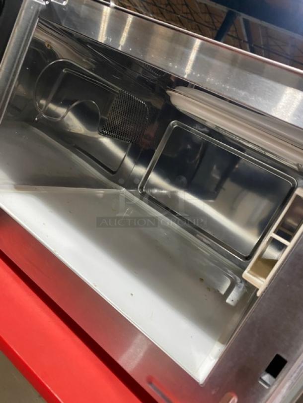 Turbo Air Radiance Series countertop microwave oven, model TMW1100NE, stainless steel, electric, digital controls, on legs.