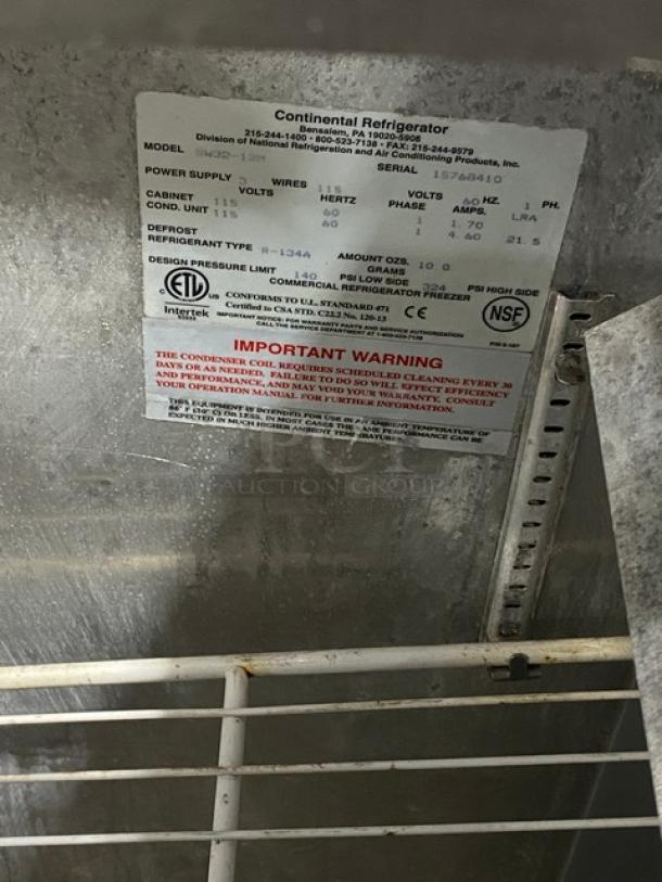 Continental Model SW32-12M black single-door refrigerated prep table label, serial number 15768410, 115V, 1 phase.
