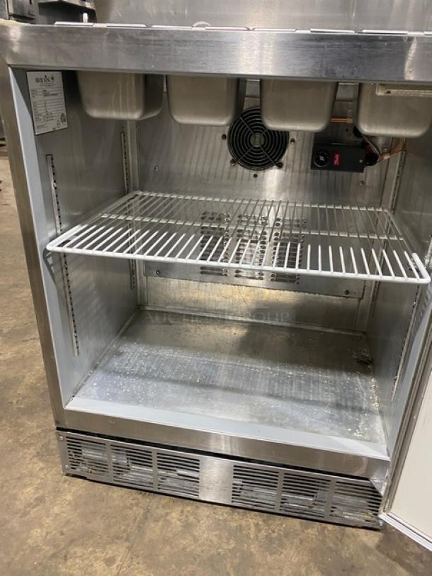 Silver King stainless steel refrigerated ice cream topping dispenser, model SKF2A, with poly-coated wire rack and dispenser pumps, 115V.