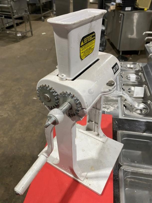 Weston Commercial White Cast Aluminum Manual Countertop Meat Cuber/Tenderizer with crank bar in good condition.