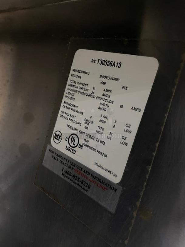 Traulsen TU048QC commercial stainless steel quick chiller with backsplash, poly-coated rack, on casters; SN: T30356A13.