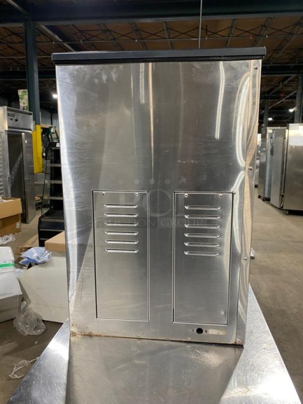 Blendtec 2019 commercial stainless steel blender, Model BDI503, shown on a countertop. Features dual vented panels.