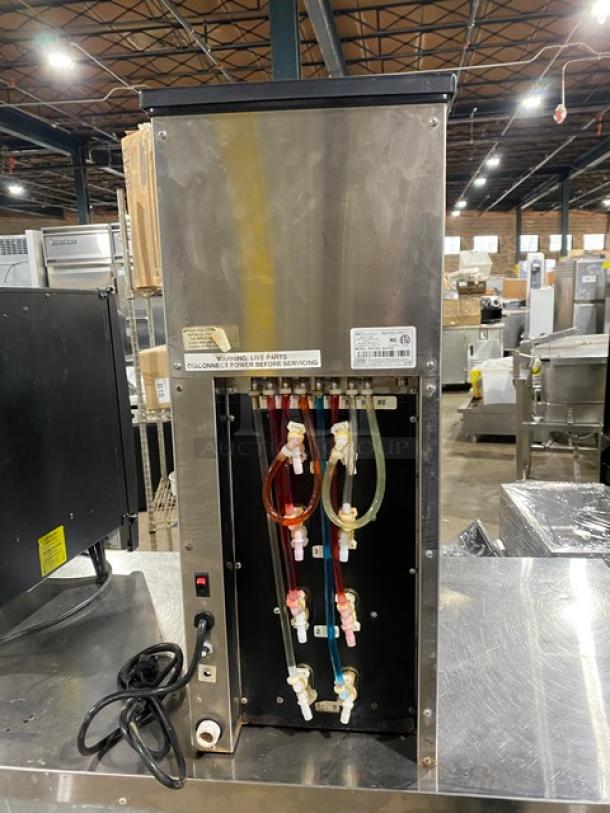 Blendtec BDI503 commercial stainless steel electric blender, 2019 model, 120V, with beverage mixer and dispenser, in good condition.