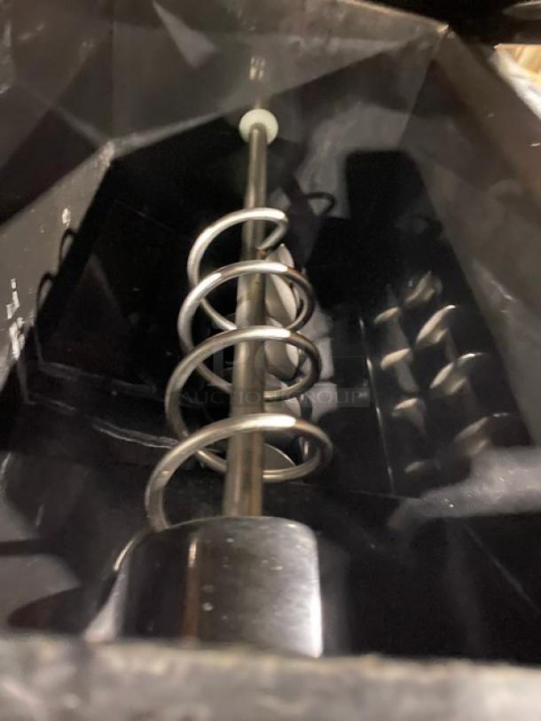 Blendtec BDI503 commercial stainless steel blender interior view, showing spiral mixing mechanism. Model: BDI-503 SN: BDI03-20917.