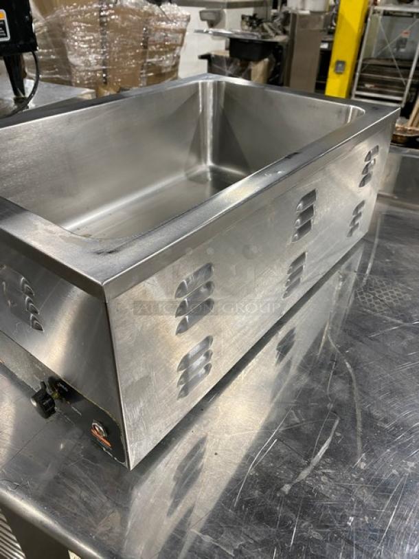 Nemco stainless steel electric countertop single well hot food warmer, excellent condition, featuring vented sides.