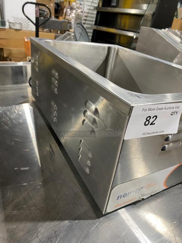 Nemco stainless steel electric countertop hot food warmer, single well, good condition, model details visible, auction tag attached.