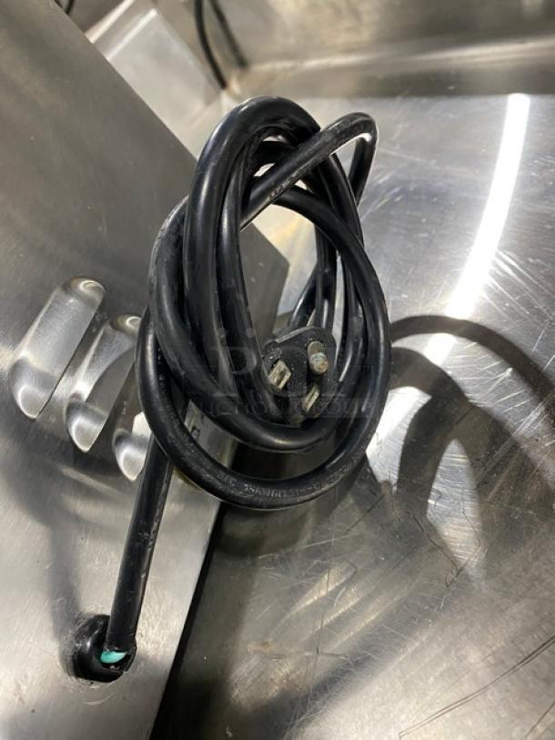 Nemco stainless steel electric countertop single well hot food warmer in good condition with visible power cord.