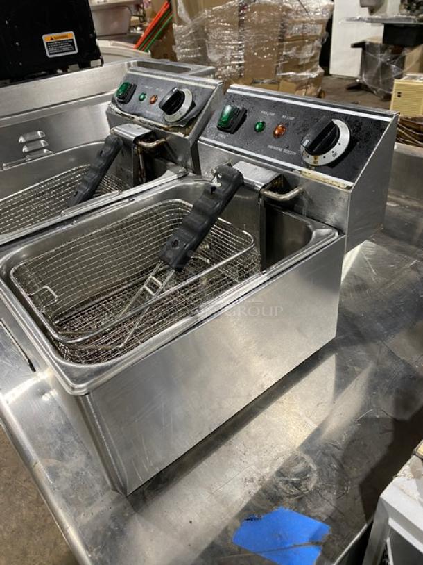 Adcraft DF6L2 dual 6L stainless steel fryer with mesh baskets and knobbed lids, 120V, commercial use, good condition.