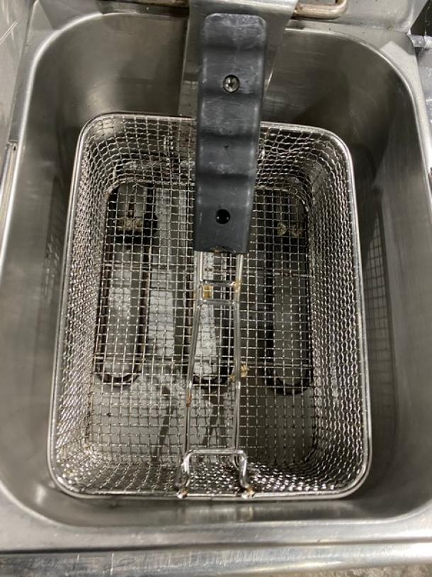 Adcraft DF6L2 commercial stainless steel electric countertop dual 6L deep fat fryer with knobbed lid and mesh fry basket.