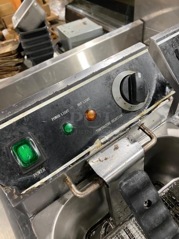 Adcraft DF6L2 Commercial Stainless Steel Electric Fryer, dual 6L. capacity, with knobbed cover and mesh fry basket, 120V, used condition.