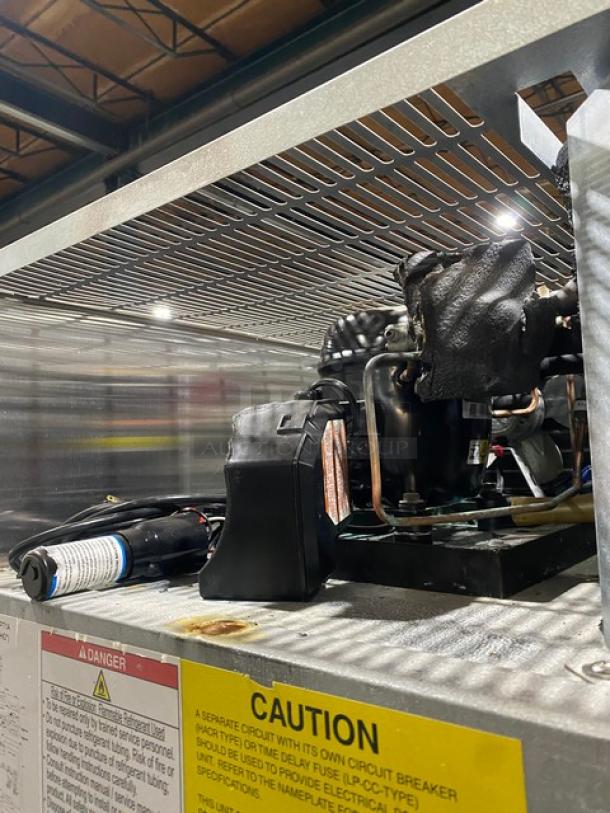 Hoshizaki Model R2AFS compressor and wiring detail, stainless steel, with caution label. Perfect for commercial use, on casters.