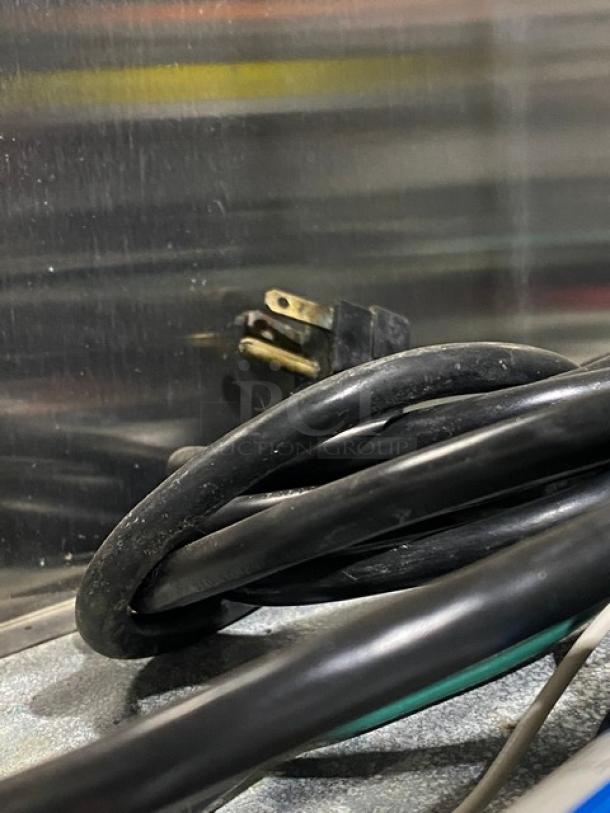 Power cord of a Hoshizaki R2A-FS commercial refrigerator, model R2AFS, showing a standard three-prong plug.