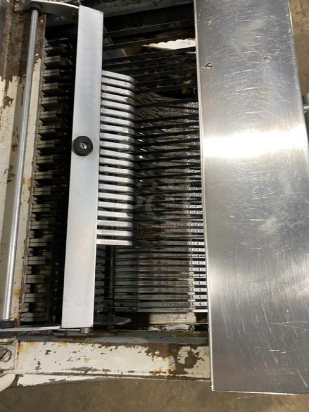 Berkel MB7/16 electric bread slicing machine, 7/16" slices, countertop model, visible wear, stainless steel components, 115V.