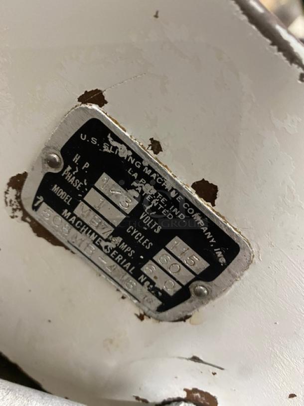 Berkel MB7/16 white bread slicer, electric-powered, 7/16", 115V, 1 phase. Serial number 508MB-4167/16. Slight wear visible.