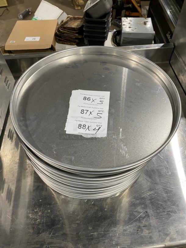 American Metalcraft aluminum pizza pan stack, new condition, heavy weight, straight-sided. Tags show auction details.