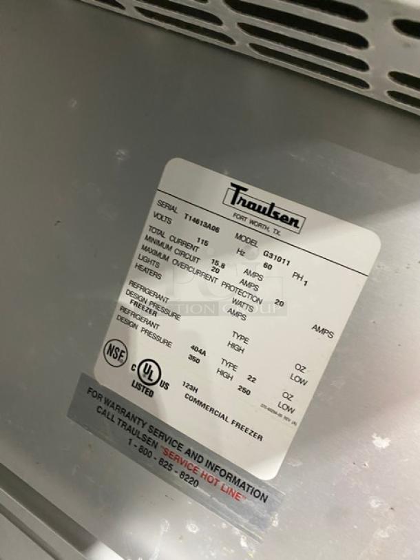 Traulsen G-Series 3-Door Stainless Steel Freezer, Model G31011, with poly coated rack, 115V, on casters.
