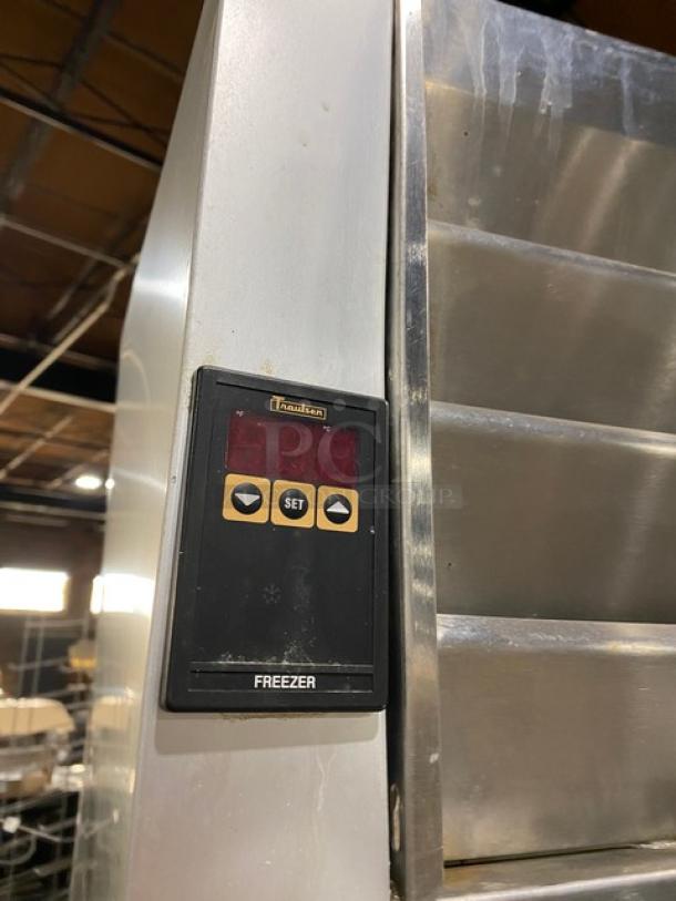 Traulsen G-Series 3 Door Reach-In Freezer, Model G31011, stainless steel, control panel, on casters.