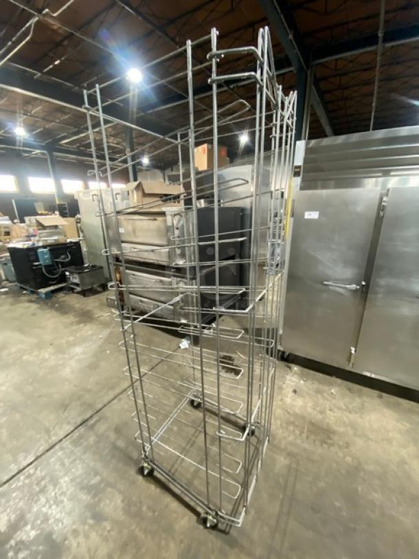 Commercial steel flat wire bread rack on casters, excellent condition, durable construction, ideal for bakery use.