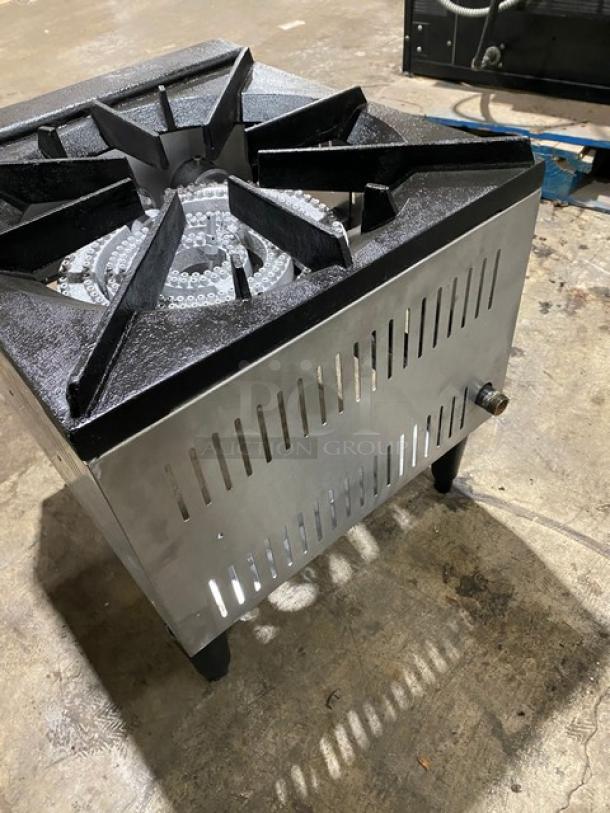 L&J Model OWST0182 stainless steel gas burner, on legs. Features heavy-duty cast iron grate, vented sides, in good condition.