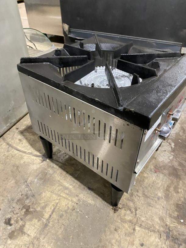 L&J stainless steel natural gas single burner stock pot range, model OWST-018-2, on legs, in used condition.