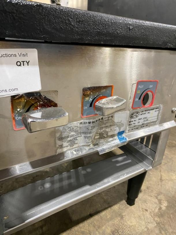 L&J stainless steel natural gas single burner stock pot range, Model OWST0182, in used condition, with control knobs and labels.