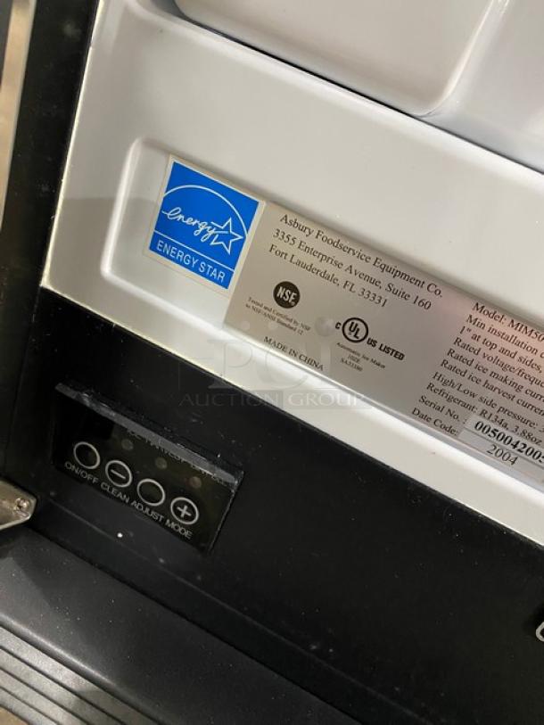 Maxx Ice MIM50 ice maker with Energy Star label, model and serial numbers, and NSF certification. Scratch-N-Dent, includes ice scoop.
