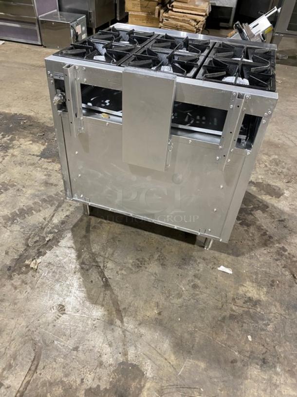 CPG 351S36N 36" stainless steel 6-burner gas range/oven combo, excellent condition, with wired oven rack, on legs.