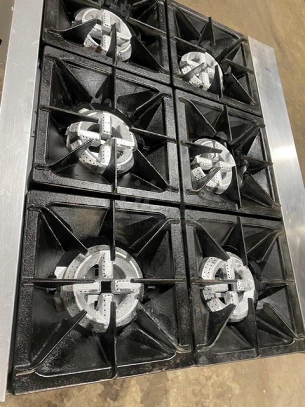 CPG 36" 6-burner stainless steel range/oven, model 351S36N, natural gas, includes wired oven rack, on legs, SN: 03224046.