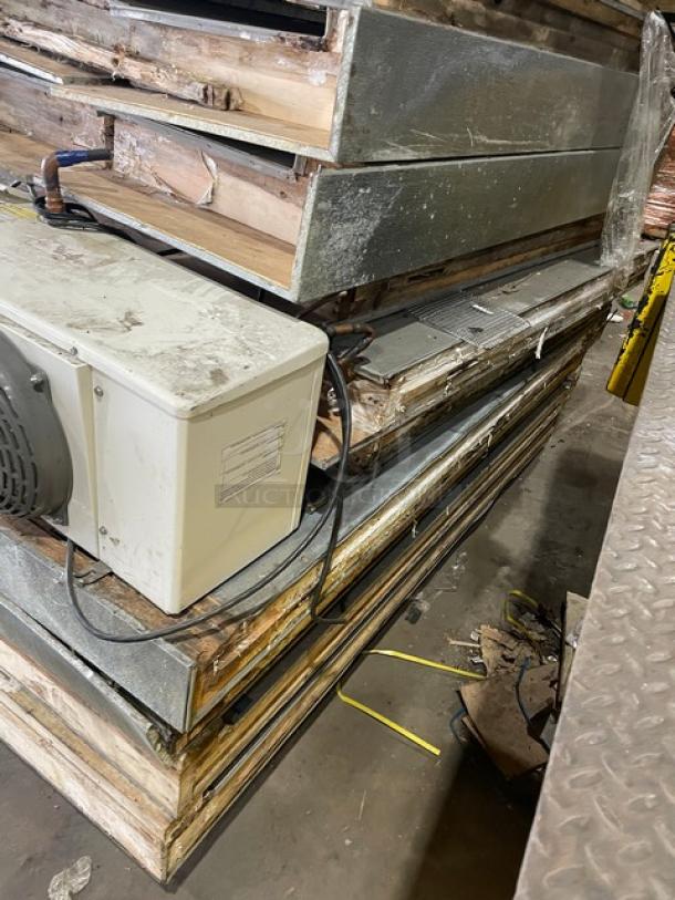 Commercial 8'x8' walk-in freezer components, includes blower. No compressor. Heavy-duty panels. Used condition.