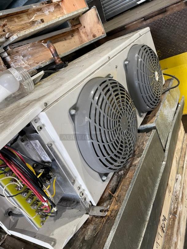 Commercial heavy-duty 8'x8' walk-in freezer with blower, no compressor, showcasing dual fan unit and wiring, used condition.