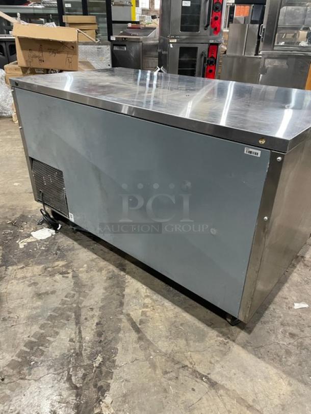 True TUC-60-32 stainless steel under-counter refrigerator, 2 doors, poly-coated rack, on casters, model SN: 9113411.