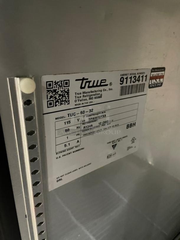 True TUC-60-32 commercial stainless steel 2-door worktop refrigerator label, showing model, SN 9113411, 115V, 1 phase.
