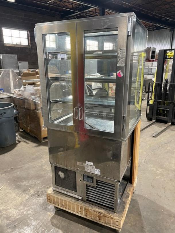 RPI Industries Vienna Series stainless steel refrigerated meat display case, model VICD234RSQSC, 115V, on casters, two-tiered glass.