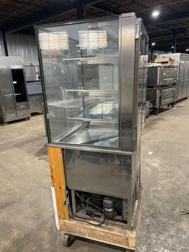 RPI Industries Vienna Series refrigerated display case, model VICD234RSQSC, stainless steel, glass multi-tier, on casters.