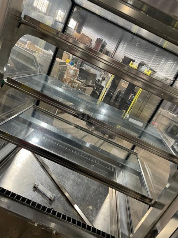 RPI Industries Vienna Series stainless steel refrigerated display case, Model VICD234RSQSC, multi-tier, on casters.