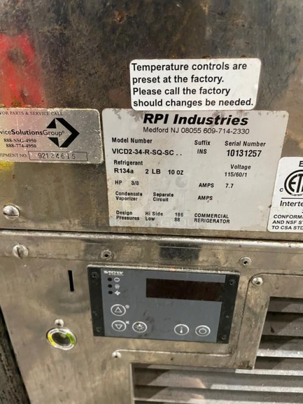RPI Industries VICD234RSQSC commercial refrigerated display case label showing model, serial number, voltage, and refrigerant details.