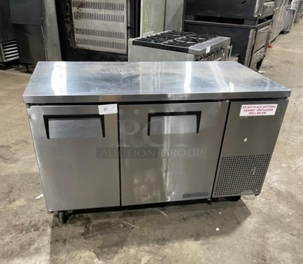 True Commercial Stainless Steel 2 Door Undercounter 60" Worktop Refrigerator, Model TUC-60-32, with casters and poly coated rack.