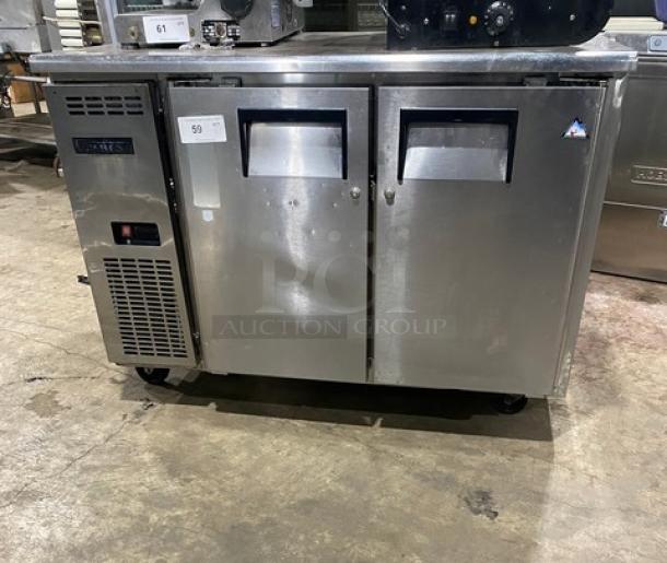 Everest ETR2 stainless steel 2-door undercounter refrigerator, poly coated rack, 115V 1 Phase, on casters, used.