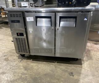 Everest ETR2 stainless steel 2-door undercounter refrigerator, poly coated rack, 115V 1 Phase, on casters, used.