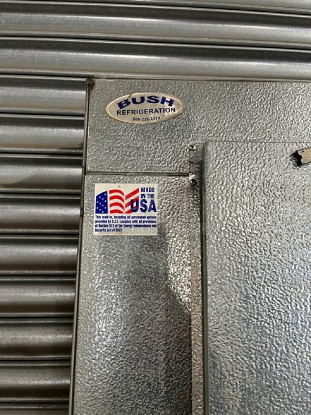 Bush Refrigeration 8'x8' walk-in freezer box with blower, no compressor. Made in USA, SN: CI-284648, heavy-duty condition.
